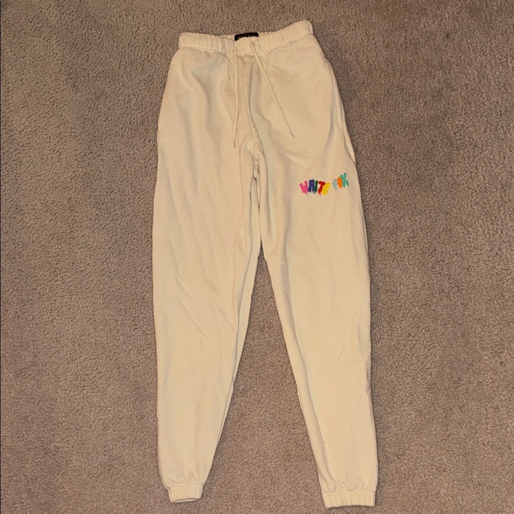 White Fox Boutique Cream Sweatpants with Multicolor Logo